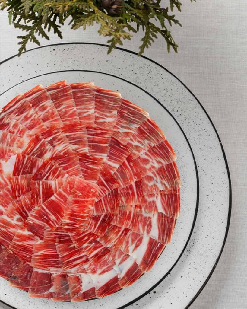 emplatado jamón ibérico jamón y vino Beher